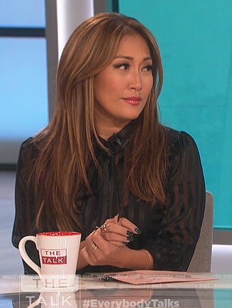 Carrie’s black stripe sheer blouse on The Talk