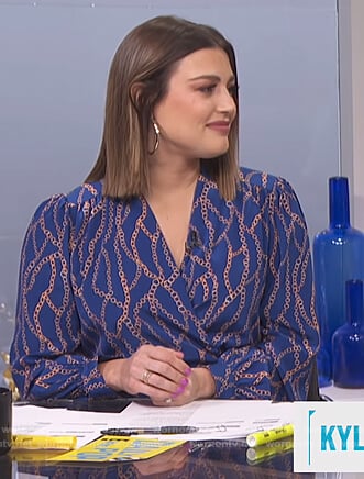 Carissa’s blue chain print wrap top on E! News Daily Pop