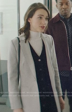 Cara’s grey coat and button front corduroy dress on God Friended Me
