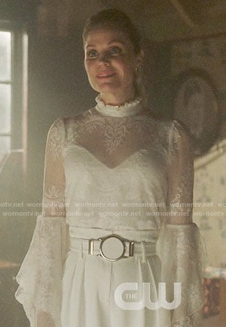 Charity’s white lace bell-sleeve top on Charmed