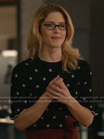 Felicity’s black floral ruffle sleeve sweater on Arrow
