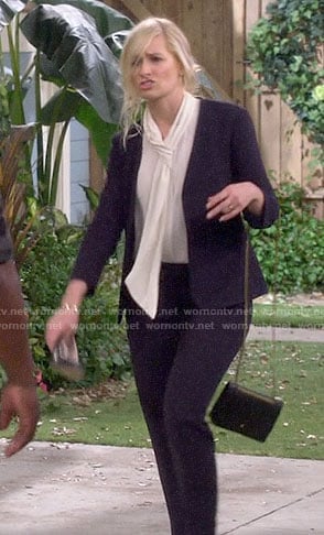 Gemma’s navy suit on The Neighborhood