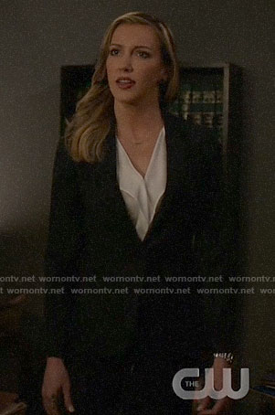 Laurel’s white ruffle front blouse on Arrow