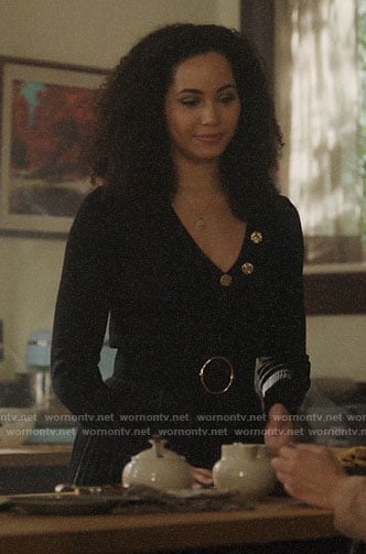 Macy’s black v-neck top with gold buttons on Charmed