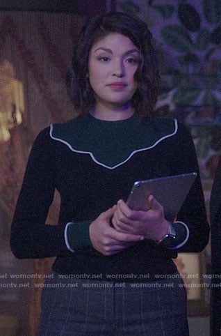 Niko’s black and green sweater on Charmed