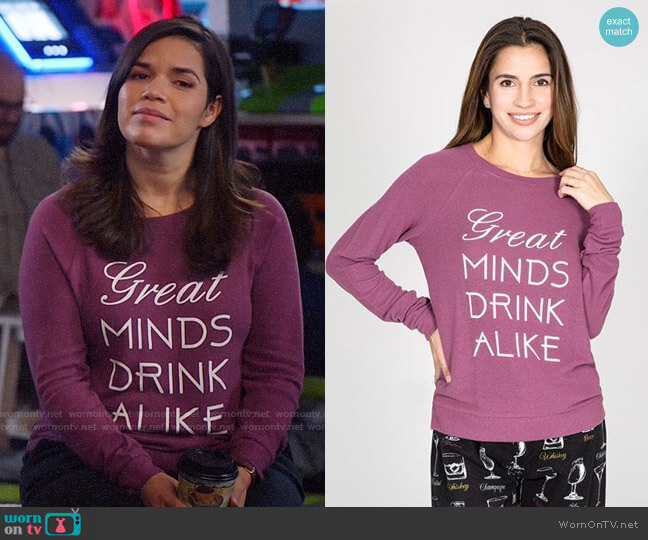 PJ Salvage Peachy Graphic Long Sleeve Top in Wine worn by Amy (America Ferrera) on Superstore