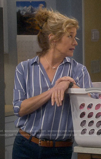Vanessa’s blue striped top and navy wedges on Last Man Standing