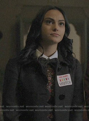 Betty’s pink floral dress and black coat on Riverdale