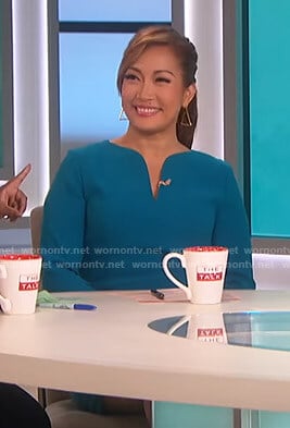 Carrie’s blue v-neck bell sleeve dress on The Talk
