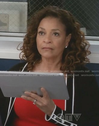 Catherine’s black cardigan with white piping on Grey’s Anatomy