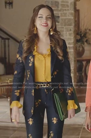 Fallon’s yellow ruffle blouse and floral suit on Dynasty
