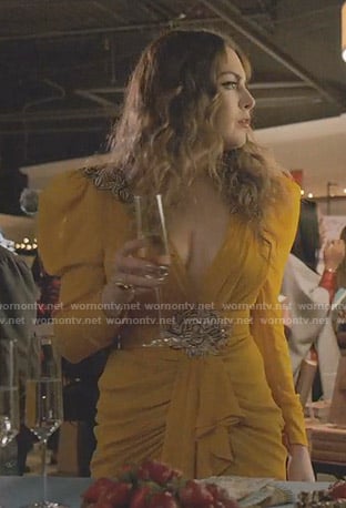 Fallon’s orange embroidered mini dress on Dynasty