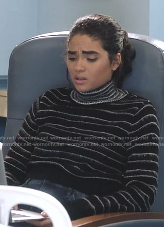 Simone’s black striped turtleneck sweater on Star