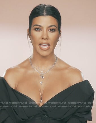 Kourtney’s navy off shoulder shirt on Keeping Up with the Kardashians