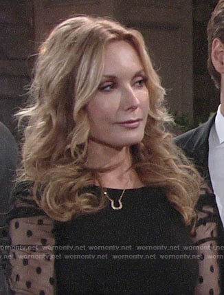 Lauren’s black polka dot mesh sleeve dress on The Young and the Restless