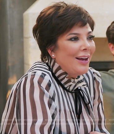 Kris’s striped ruffle neck blouse on Keeping Up with the Kardashians