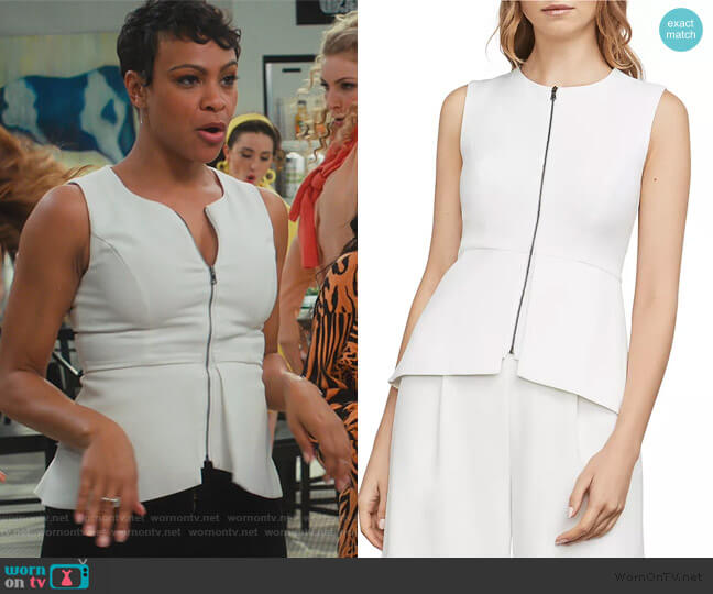 BCBGMAXAZRIA Abrielle Peplum Top worn by Angela (Carly Hughes
) on American Housewife