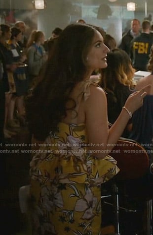 Cristal’s yellow floral peplum top and skirt on Dynasty