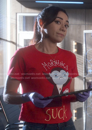 Ella’s red Mornings Suck Tee on Lucifer