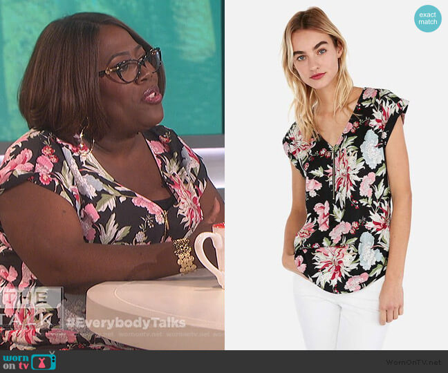 Express Floral Zip Front Gramercy Tee worn by Sheryl Underwood on The Talk