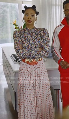Monica’s floral top and star print pleated skirt on Dynasty