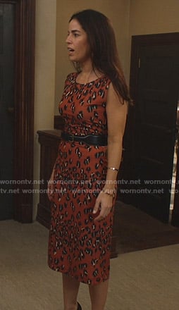 Susan’s orange leopard print dress on Whiskey Cavalier