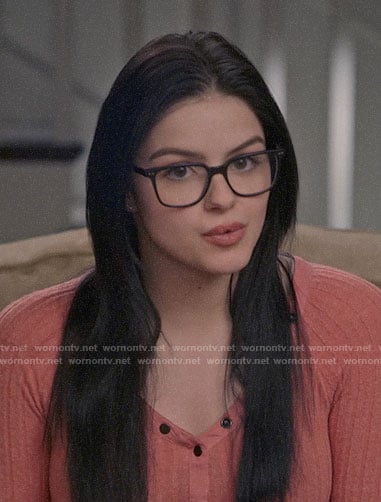 Alex’s coral henley top on Modern Family