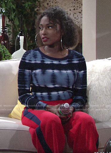 Ana’s blue tie-dye sweater and red cropped pants on The Young and the Restless