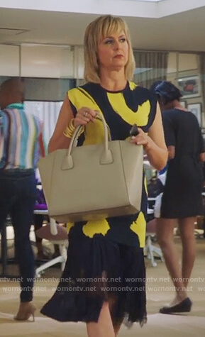 Jacqueline’s printed top and lace skirt on The Bold Type