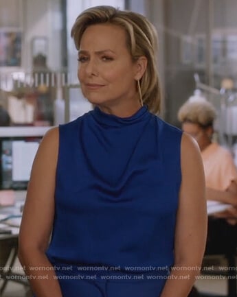 Jacqueline’s blue sleeveless top on The Bold Type