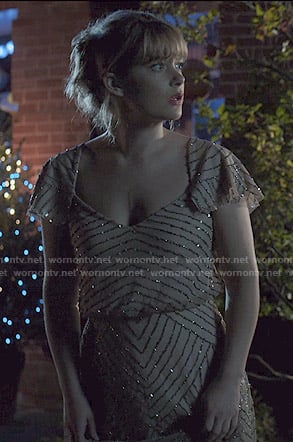 Cassandra’s beige embellished gown on The Society