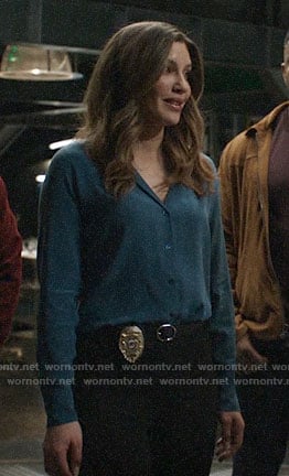 Dinah’s teal button down blouse