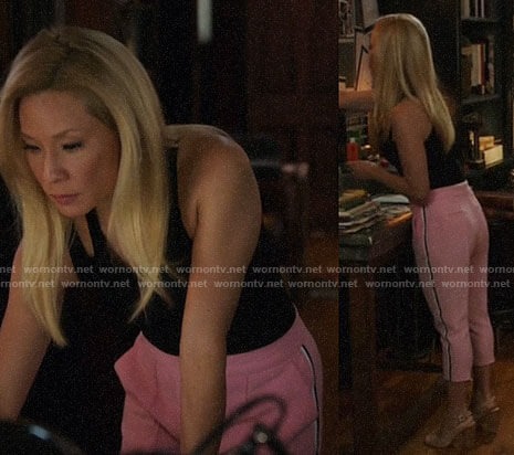 Joan’s pink cropped side-stripe pants on Elementary
