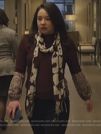 Marissa’s red printed cuffs sweater on The Good Fight