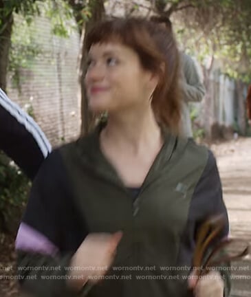 Lisa’s green track jacket on What/If
