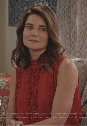 Heather’s red sleeveless ruffle front top on Life in Pieces