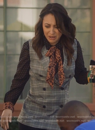 Ana’s mixed print tie neck blouse on Grown-ish