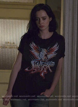 Jessica’s black Save Our Souls tee on Jessica Jones