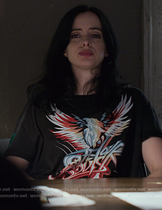 Jessica’s black Save Our Souls tee on Jessica Jones
