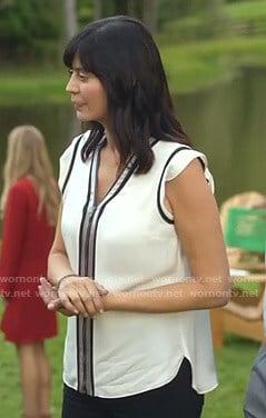 Cassie’s white zip-front top on Good Witch