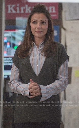 Emily’s blue striped button down shirt on Designated Survivor
