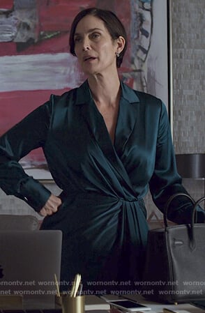 Jeryn’s green satin wrap dress on Jessica Jones