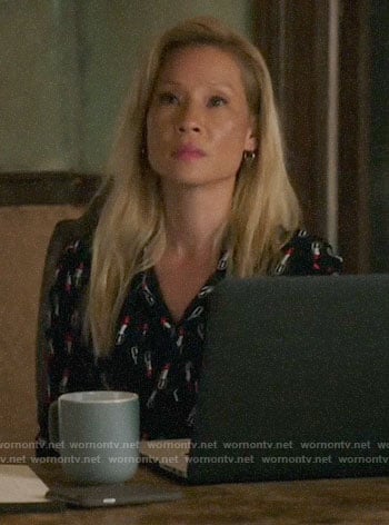 Joan’s black lipstick print blouse on Elementary