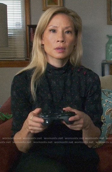 Joan’s black and red polka dot top on Elementary