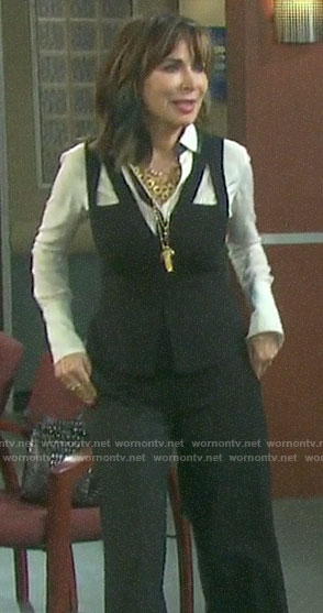 Kate’s black peplum top with cutouts on Days of our Lives