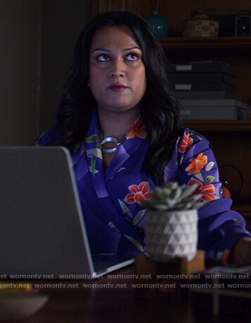 Gillian’s purple floral wrap top on Jessica Jones