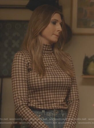 Nomi’s check turtleneck top on Grown-ish