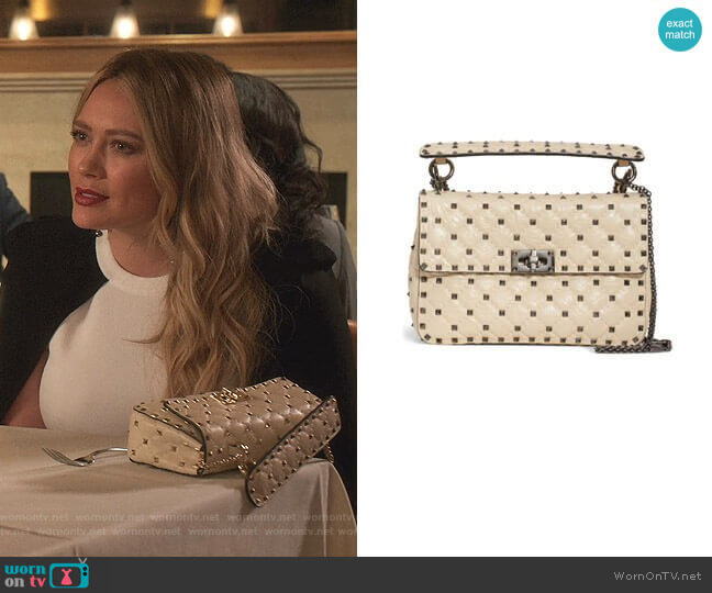 Valentino Medium Rockstud Matelassé Quilted Leather Crossbody Bag worn by Kelsey Peters (Hilary Duff) on Younger