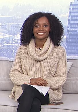 Zuri’s cowl neck sweater on Live from E!