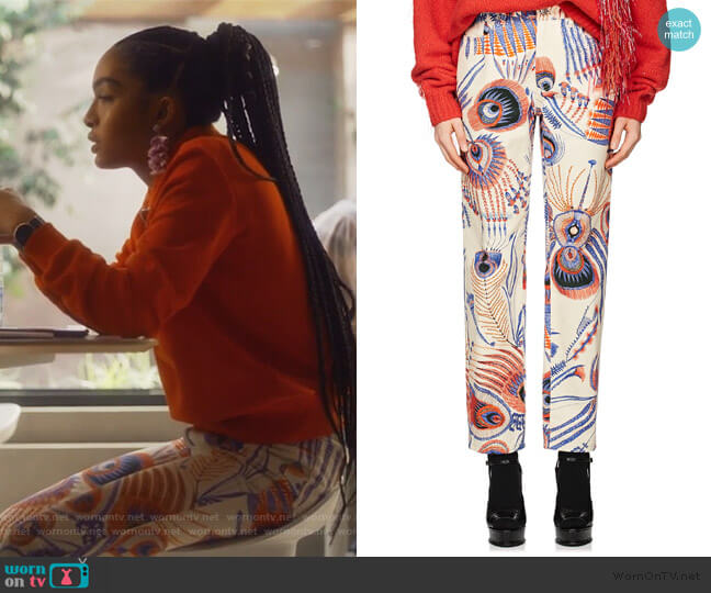 Dries Van Noten Peacock-Feather-Print Jeans worn by Zoey Johnson (Yara Shahidi) on Grown-ish